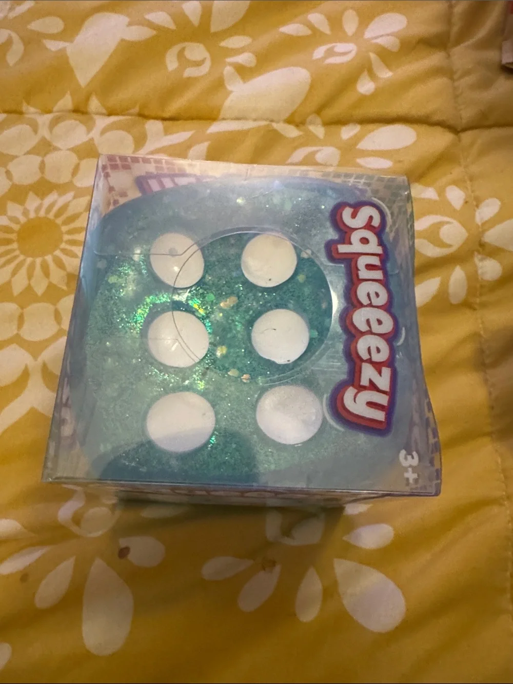 Squeeezy blue dice squishy